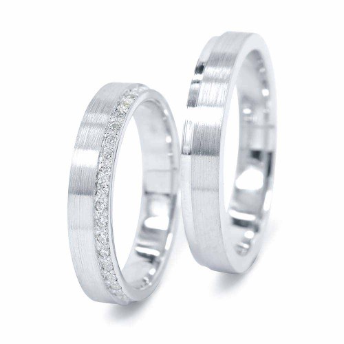 Arany karikagyűrű szélén gyémántokkal körbe foglalva