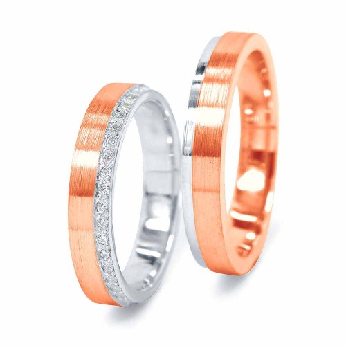 Arany karikagyűrű szélén gyémántokkal körbe foglalva