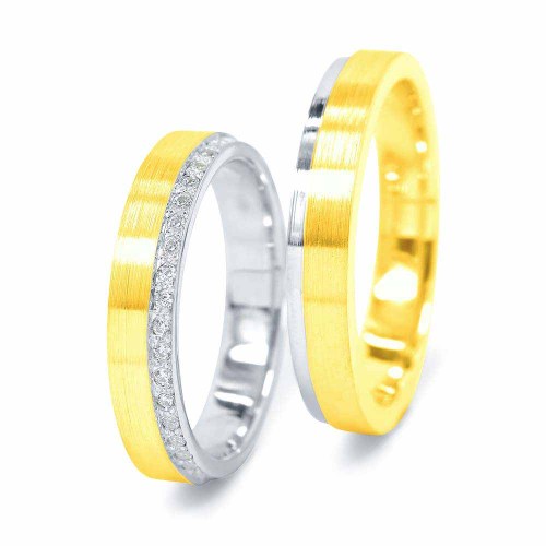 Arany karikagyűrű szélén gyémántokkal körbe foglalva